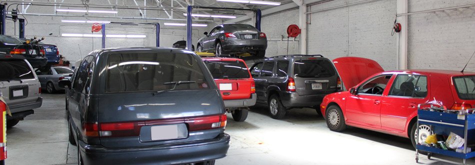 The Garage SF Logo and Luxury Cars